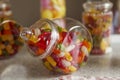 An old fashioned round glass jar of delicious jelly beans, with another out of focus jar in the background Royalty Free Stock Photo