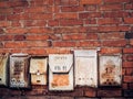 Old-fashioned russian mailboxes on the stucco wall