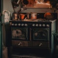 An old fashioned stove with pots and pans on top of it. AI generative image. Royalty Free Stock Photo