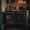 An old fashioned stove with pots and pans on top of it. AI generative image. Royalty Free Stock Photo