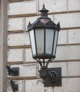 Old fashioned street light at wall Royalty Free Stock Photo