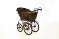 Old-fashioned stroller isolated. In the style of steampunk style.