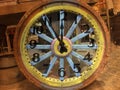 Wagon wheel and clock Royalty Free Stock Photo