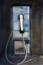 Public phone booth closeup telephone Royalty Free Stock Photo