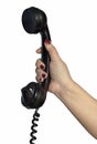 Old fashioned telephone handset in woman hand Royalty Free Stock Photo