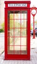 Old fashioned traditional red telephone booth or payphone Royalty Free Stock Photo