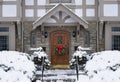 Tudor style house with Christmas wreath on front door