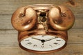 Old-fashioned vintage copper alarm clock Royalty Free Stock Photo