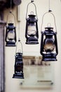 Old fashioned vintage kerosene oil lantern lamp hanging on the street background in Lviv, city style decoration Royalty Free Stock Photo