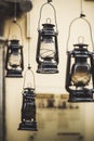 Old fashioned vintage kerosene oil lantern lamp hanging on the street background in Lviv, city style decoration Royalty Free Stock Photo