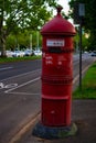 Old fashioned vintage post office mailing box in red color in Melbourne Australia Royalty Free Stock Photo