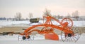 Old Fashioned Red Farm Tractor in Snow Royalty Free Stock Photo