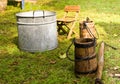 An old fashioned washing trougth filled with water, a vintage washboard and soap that wash the laundry