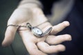 Old fashioned watch in woman hand Royalty Free Stock Photo