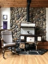 Old fashioned wood cook stove in cozy livingroom