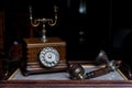 Old fashioned wooden telephone with handset beside Royalty Free Stock Photo
