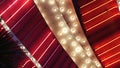 Old fasioned electric lamps blinking and glowing at night. Abstract close up of retro casino decoration shimmering in Las Vegas,