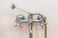 Old faucet the faucet Assembly in the bathroom. Limescale on chrome taps and mixer shower Royalty Free Stock Photo