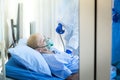 Old Female patients despaired in hospital beds Royalty Free Stock Photo