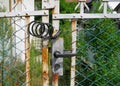Old fence closed, smart combination lock Royalty Free Stock Photo