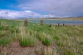 Old fence line near lake in ranch country Montana Royalty Free Stock Photo