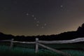 Old fence. Starry night Polaris star, Ursa Major,Big Dipper constellation Beautiful night sky. Royalty Free Stock Photo