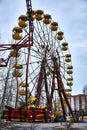 Old ferris wheel in the ghost town of Pripyat. Consequences of the accident at the Chernobil nuclear power plant