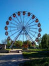 Old Ferris wheel in the old Park against the blue sky Royalty Free Stock Photo