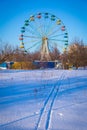 Old ferris wheel on winter park Royalty Free Stock Photo