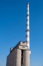 Old fertilizer plant silo and chimney in Drapetsona Piraeus Greece, sunny day Royalty Free Stock Photo