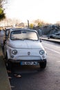 Old Fiat 600 car parked on a roadside in Paris Royalty Free Stock Photo