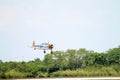 Old fighter plane flying Royalty Free Stock Photo