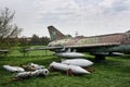 Old fighter plane with a variety of bombs Royalty Free Stock Photo