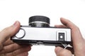 Old film camera in hands Royalty Free Stock Photo