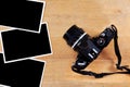 Old film camera and photo paper Royalty Free Stock Photo