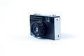 Old film camera side view. White background close-up. Vintage photo . Royalty Free Stock Photo