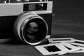 Old Film Camera and Slides Black and White Royalty Free Stock Photo