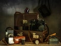 Old film cameras, photographic film, leather cases for photographic equipment. Old photographic equipment. Royalty Free Stock Photo