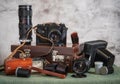 Old film cameras, photographic film, leather cases for photographic equipment. Old photographic equipment. Royalty Free Stock Photo