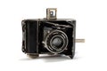 Old film photo camera on white background Royalty Free Stock Photo