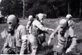 An old film photo of the training of sanitary squads in 1989 to provide first aid and evacuation from the lesion in the village of