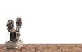 Old film projector on a stack of books on a wooden table Royalty Free Stock Photo