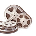 Old film reel with strip isolated on white background. Royalty Free Stock Photo