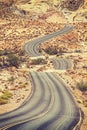 Old film retro stylized picture of a scenic winding road, USA Royalty Free Stock Photo