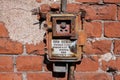 Old fire alarm button on a brick wall Royalty Free Stock Photo