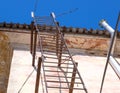 Old fire escape leading to the roof Royalty Free Stock Photo