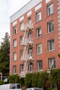 An old fire escape stairs on the side of a building. Royalty Free Stock Photo