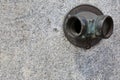 Old Fire Hydrant on Granite Wall of City Building