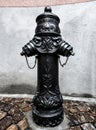 Old fire hydrant, water column on the street in Sion Royalty Free Stock Photo