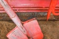 Old fire red box with a shovel and hook and tools to help during a dangerous situation Royalty Free Stock Photo